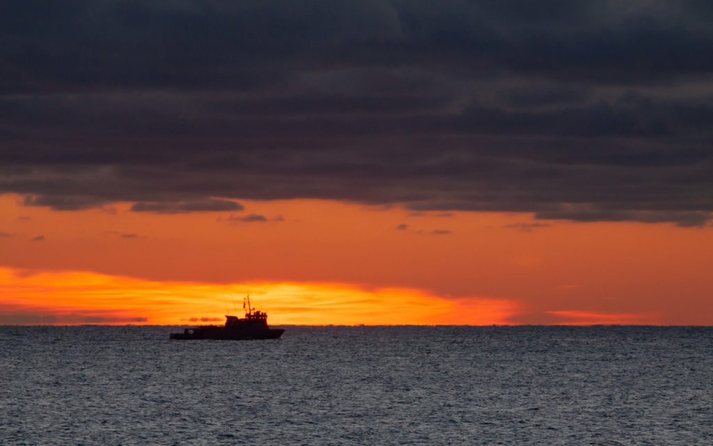 sunrise with boat cap d'antibes