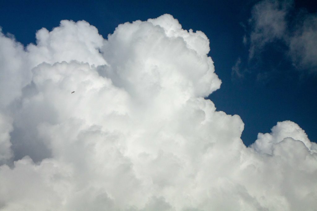 White fluffy clouds and blue sky