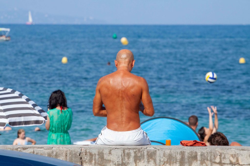 colourful people on the beach