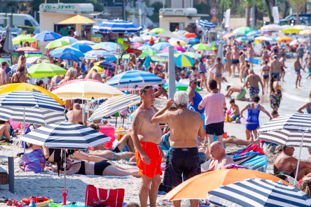 colourful people on the beach